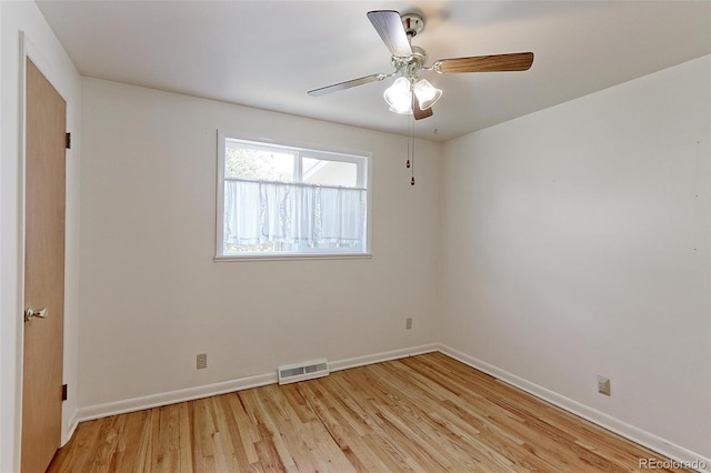 unfurnished room featuring ceiling fan and light hardwood / wood-style flooring