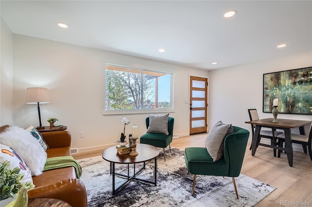 2065 Depew St, Edgewater, CO 80214 - living area featuring recessed lighting, light wood-style flooring, and baseboards