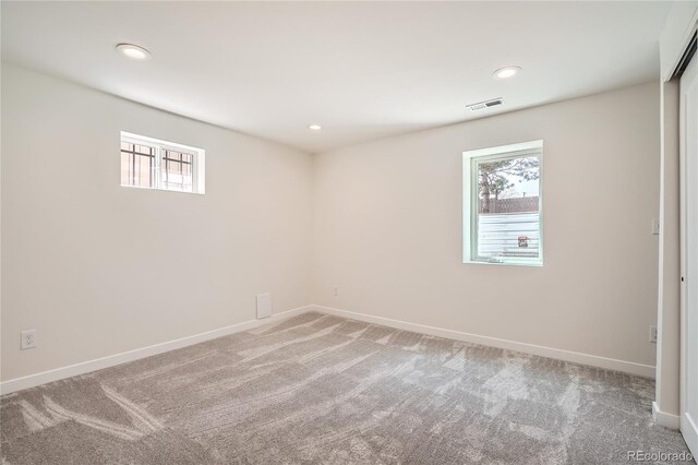 2065 Depew St, Edgewater, CO 80214 - unfurnished room featuring light colored carpet, baseboards, and recessed lighting