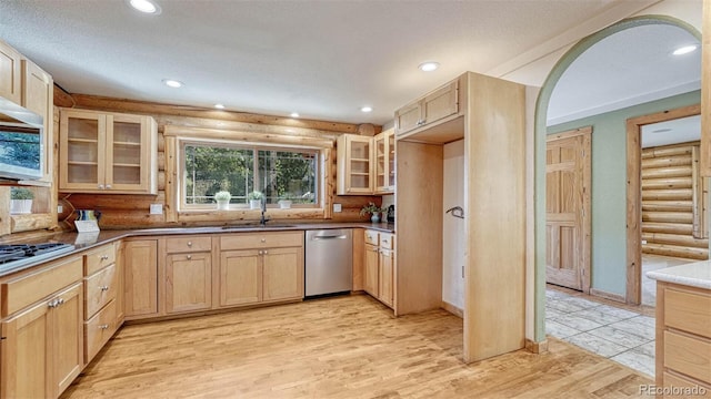 kitchen with light brown cabinetry, recessed lighting, appliances with stainless steel finishes, and glass insert cabinets