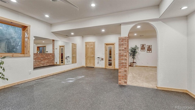 interior space featuring recessed lighting and baseboards