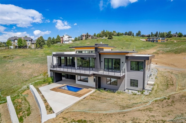 545 Strada Rossa Rd, Golden, CO 80401 - rear view of house with a patio