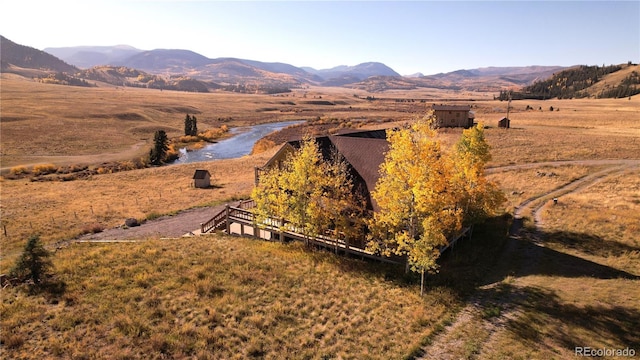 property view of mountains featuring a rural view