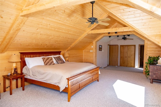 bedroom featuring vaulted ceiling with beams and light carpet