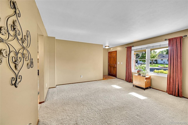 12348 Elizabeth Ct, Thornton, CO 80241 - empty room featuring carpet flooring and baseboards
