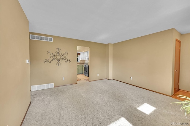 12348 Elizabeth Ct, Thornton, CO 80241 - empty room featuring light carpet and baseboards