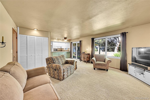 12348 Elizabeth Ct, Thornton, CO 80241 - living area with light colored carpet and a ceiling fan