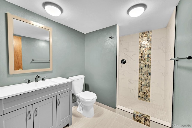 12348 Elizabeth Ct, Thornton, CO 80241 - full bath with toilet, vanity, a tile shower, and baseboards