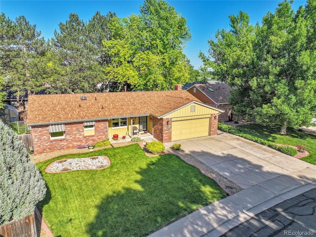 12348 Elizabeth Ct, Thornton, CO 80241 - ranch-style house with brick siding, a front lawn, a garage, and concrete driveway