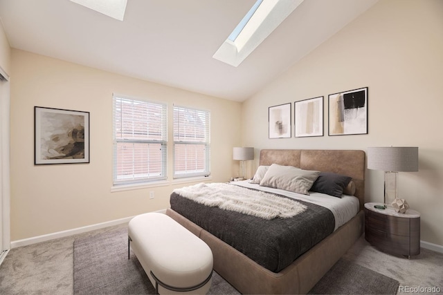 bedroom with light carpet and lofted ceiling