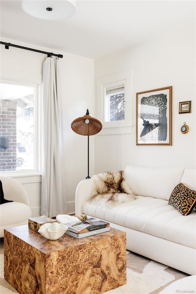 living room featuring plenty of natural light