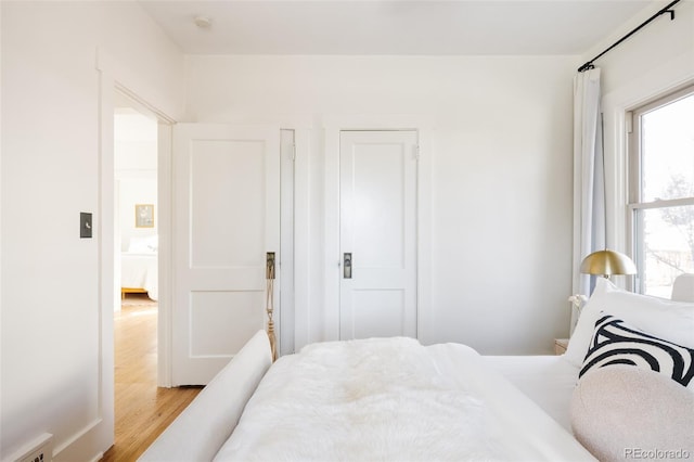 bedroom featuring light hardwood / wood-style floors