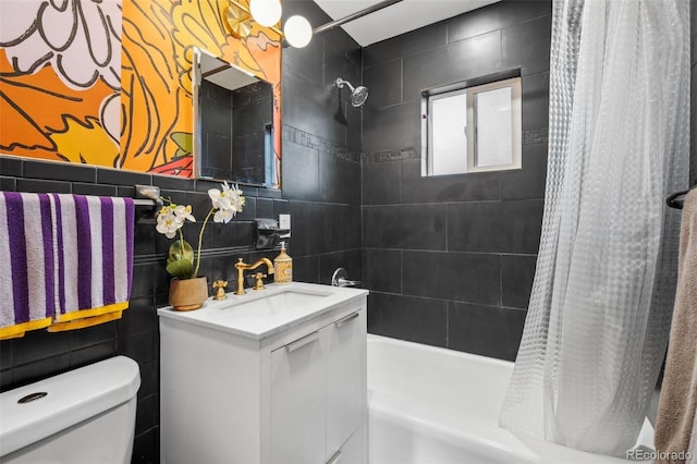 full bathroom featuring shower / tub combo with curtain, vanity, tile walls, and toilet