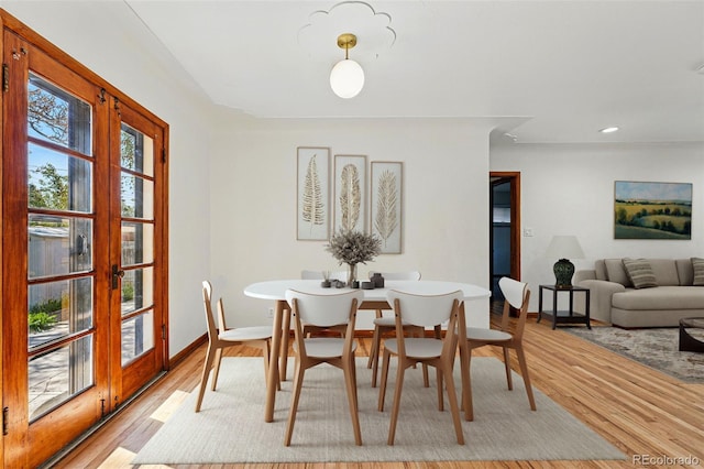 2042 Jamaica St, Aurora, CO 80010 - dining room with french doors, light wood-style floors, baseboards, and recessed lighting