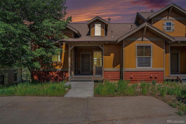 109 Peak Vw, Granby, CO 80446 - view of front of house featuring roof with shingles and a porch