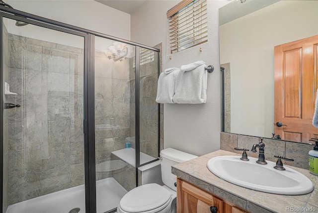 109 Peak Vw, Granby, CO 80446 - bathroom with toilet, vanity, and a stall shower
