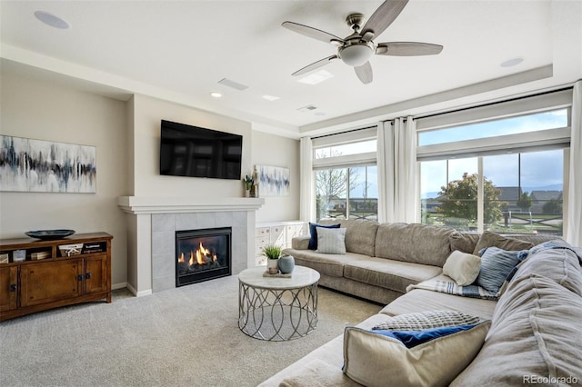 6880 Backcountry Loop, Colorado Springs, CO 80927 - living room featuring a ceiling fan, a fireplace, carpet, and recessed lighting