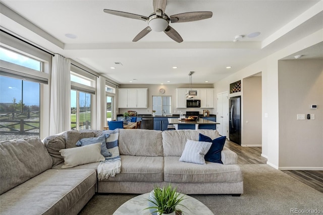 6880 Backcountry Loop, Colorado Springs, CO 80927 - living room with light wood-type flooring, baseboards, a ceiling fan, and recessed lighting