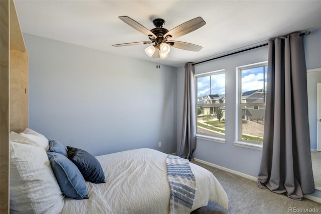 6880 Backcountry Loop, Colorado Springs, CO 80927 - carpeted bedroom with a ceiling fan and baseboards