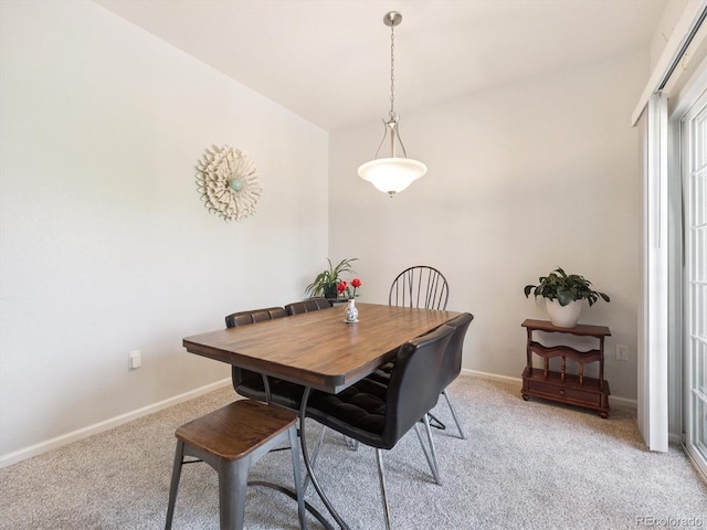 3662 S Perth Cir Unit 104, Aurora, CO 80013 - dining area featuring light carpet