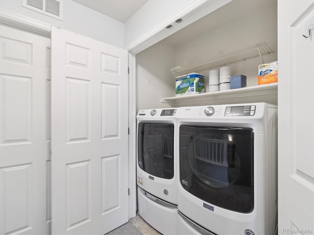 3662 S Perth Cir Unit 104, Aurora, CO 80013 - laundry room with washing machine and dryer