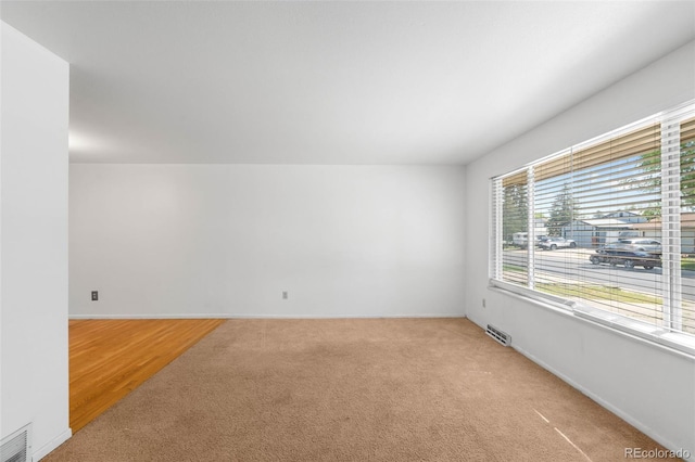 6953 Ingalls St, Arvada, CO 80003 - spare room featuring light carpet and baseboards