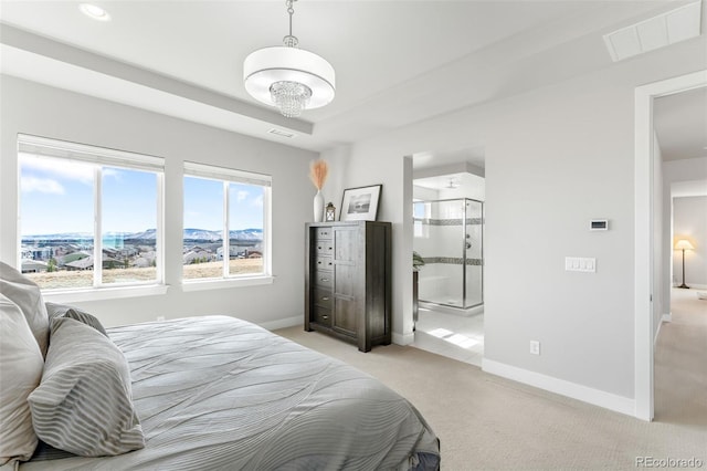 bedroom with light colored carpet, visible vents, and baseboards