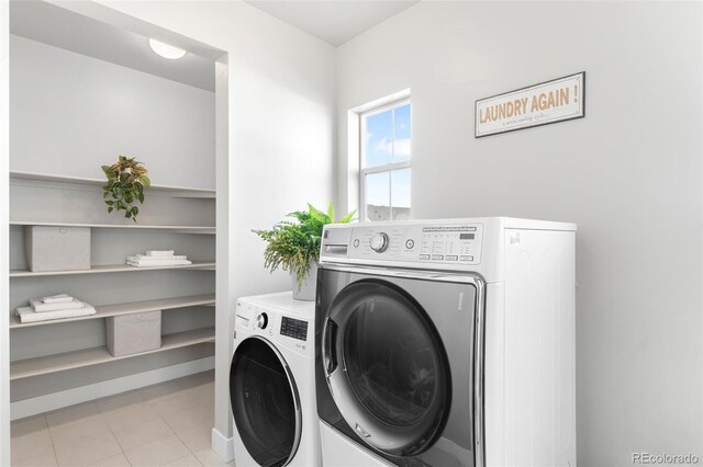 laundry area with washer and dryer and laundry area