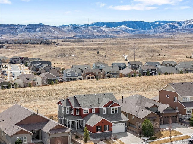 birds eye view of property featuring a residential view and a mountain view