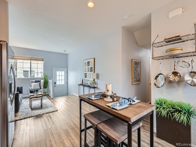 6065 Wadsworth Blvd Unit A, Arvada, CO 80003 - dining space with light wood-style flooring and baseboards