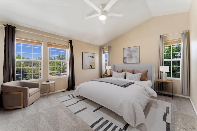 12784 Jasmine St Unit E, Thornton, CO 80602 - carpeted bedroom featuring vaulted ceiling, multiple windows, and a ceiling fan