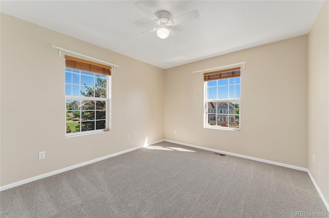 12784 Jasmine St Unit E, Thornton, CO 80602 - carpeted spare room with a ceiling fan and baseboards
