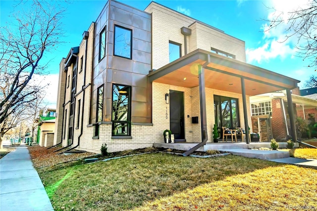 exterior space with a yard and covered porch