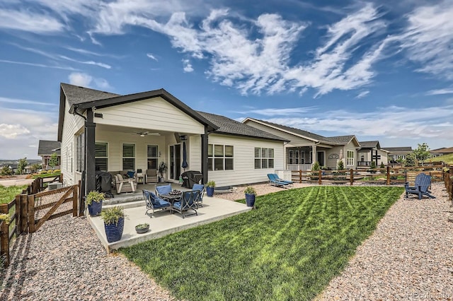 5668 Shadescale Way, Castle Rock, CO 80104 - rear view of house featuring a ceiling fan, a patio, a fenced backyard, and an outdoor hangout area
