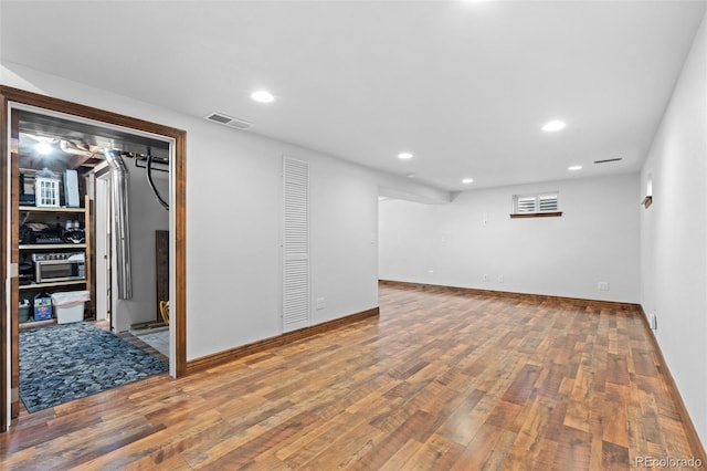 interior space with hardwood / wood-style flooring