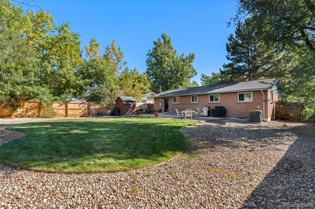 view of yard with a patio and cooling unit