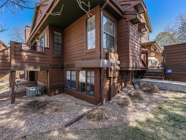 view of home's exterior featuring central AC unit