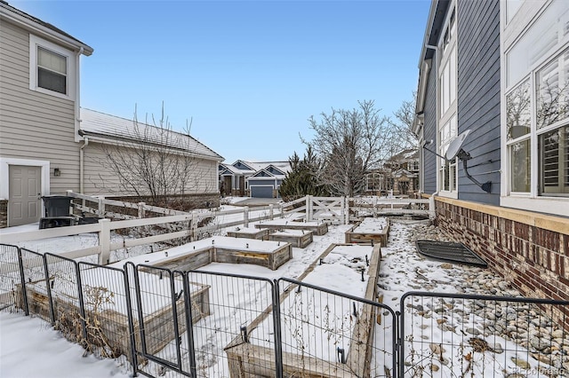 view of yard covered in snow