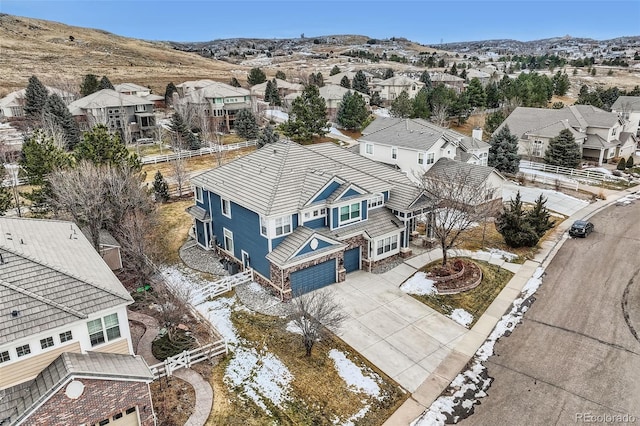 birds eye view of property featuring a mountain view