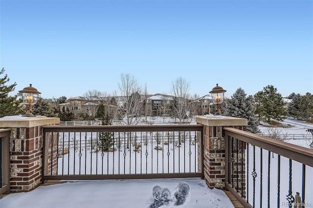 view of snow covered deck