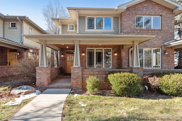 craftsman-style house featuring covered porch