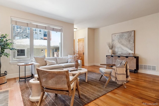 living room with hardwood / wood-style flooring