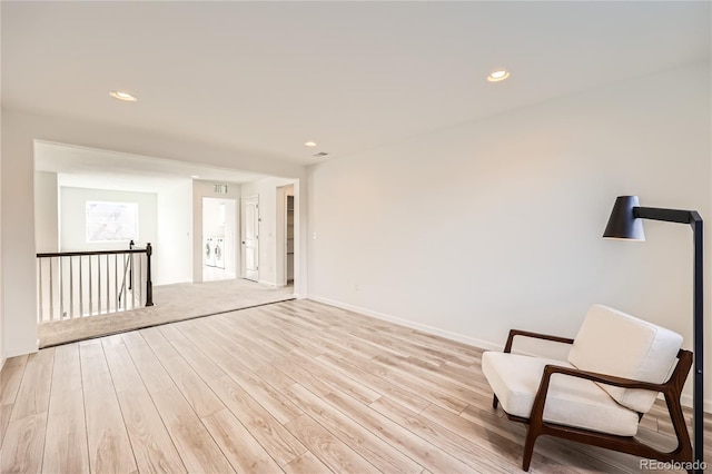 unfurnished room with light hardwood / wood-style flooring