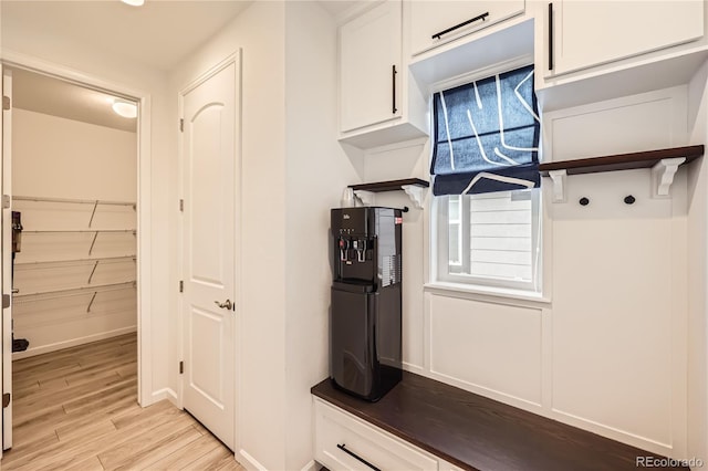 mudroom featuring a wealth of natural light and light hardwood / wood-style floors