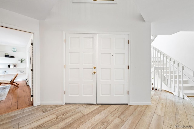 133 Mine Ln, Boulder, CO 80302 - entryway with wood finished floors and stairs