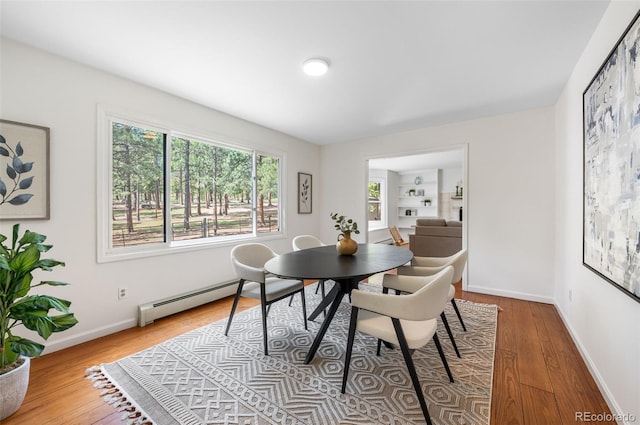 133 Mine Ln, Boulder, CO 80302 - dining room featuring baseboard heating and wood finished floors