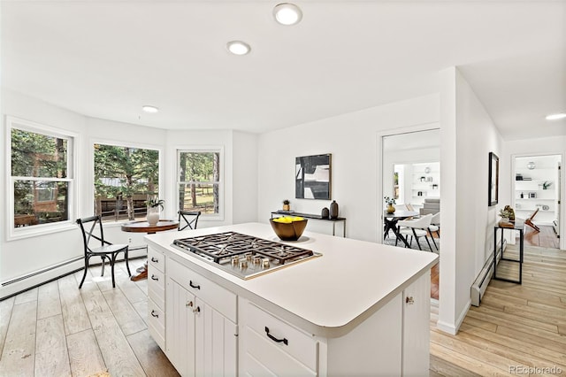 133 Mine Ln, Boulder, CO 80302 - kitchen with stainless steel gas cooktop, light wood finished floors, healthy amount of natural light, and recessed lighting