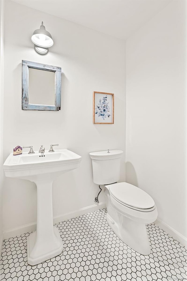 133 Mine Ln, Boulder, CO 80302 - bathroom with toilet and tile patterned floors