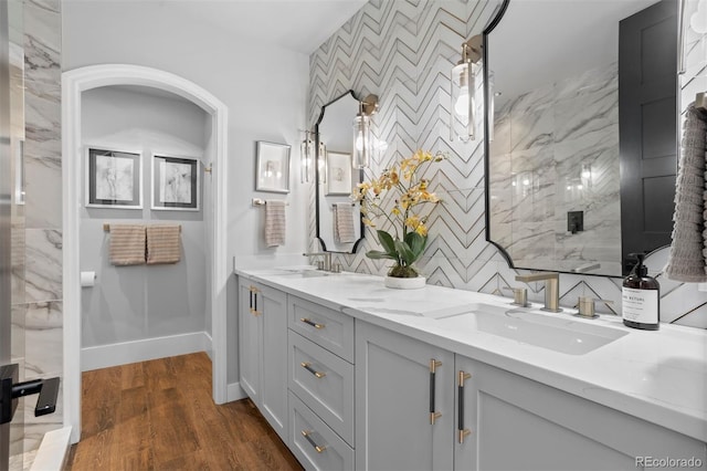 bathroom featuring hardwood / wood-style flooring and vanity