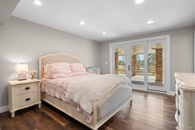 bedroom featuring dark hardwood / wood-style floors, access to exterior, and french doors